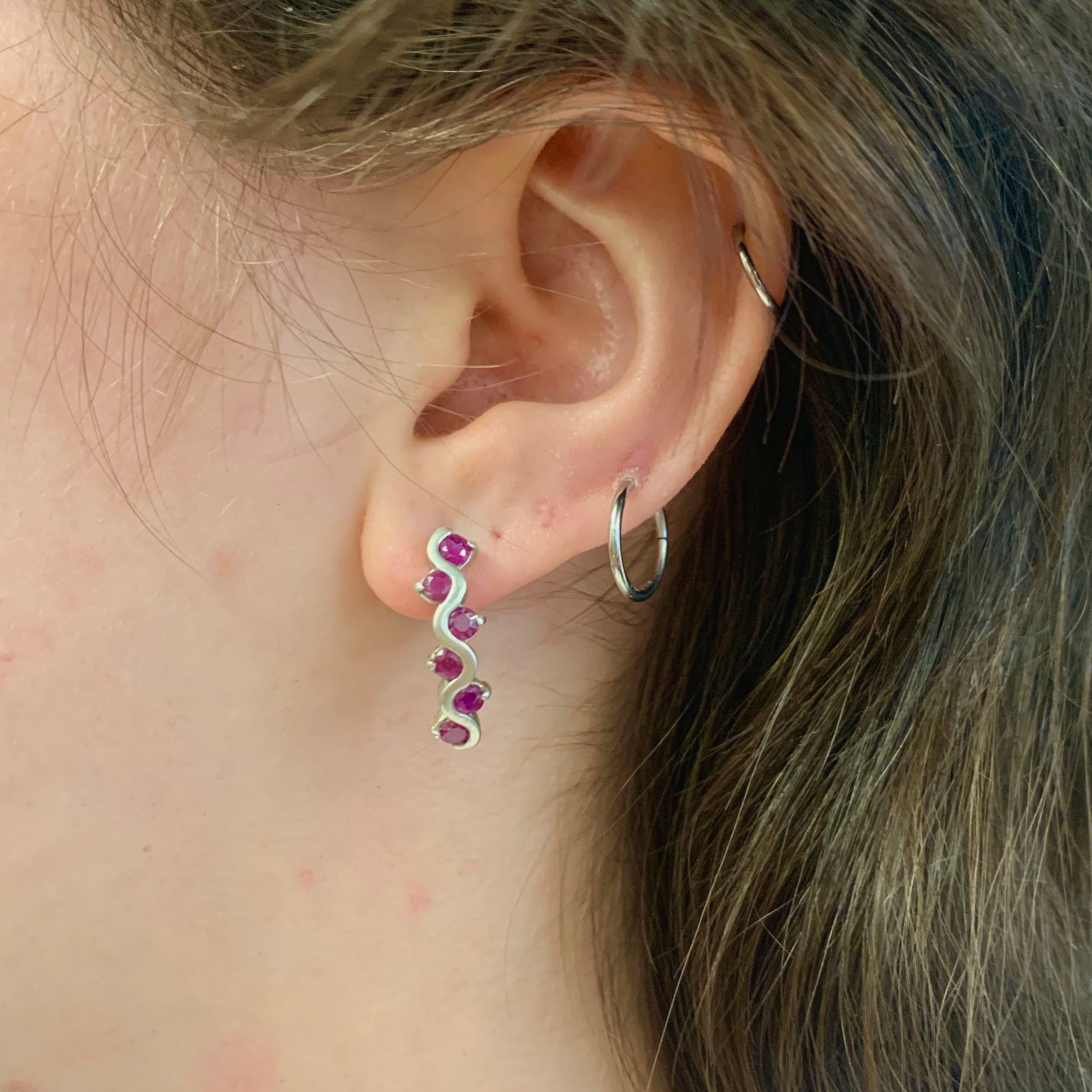 Elegant 925 Sterling Silver earrings featuring channel-set natural red rubies, perfect for birthdays and special occasions.
