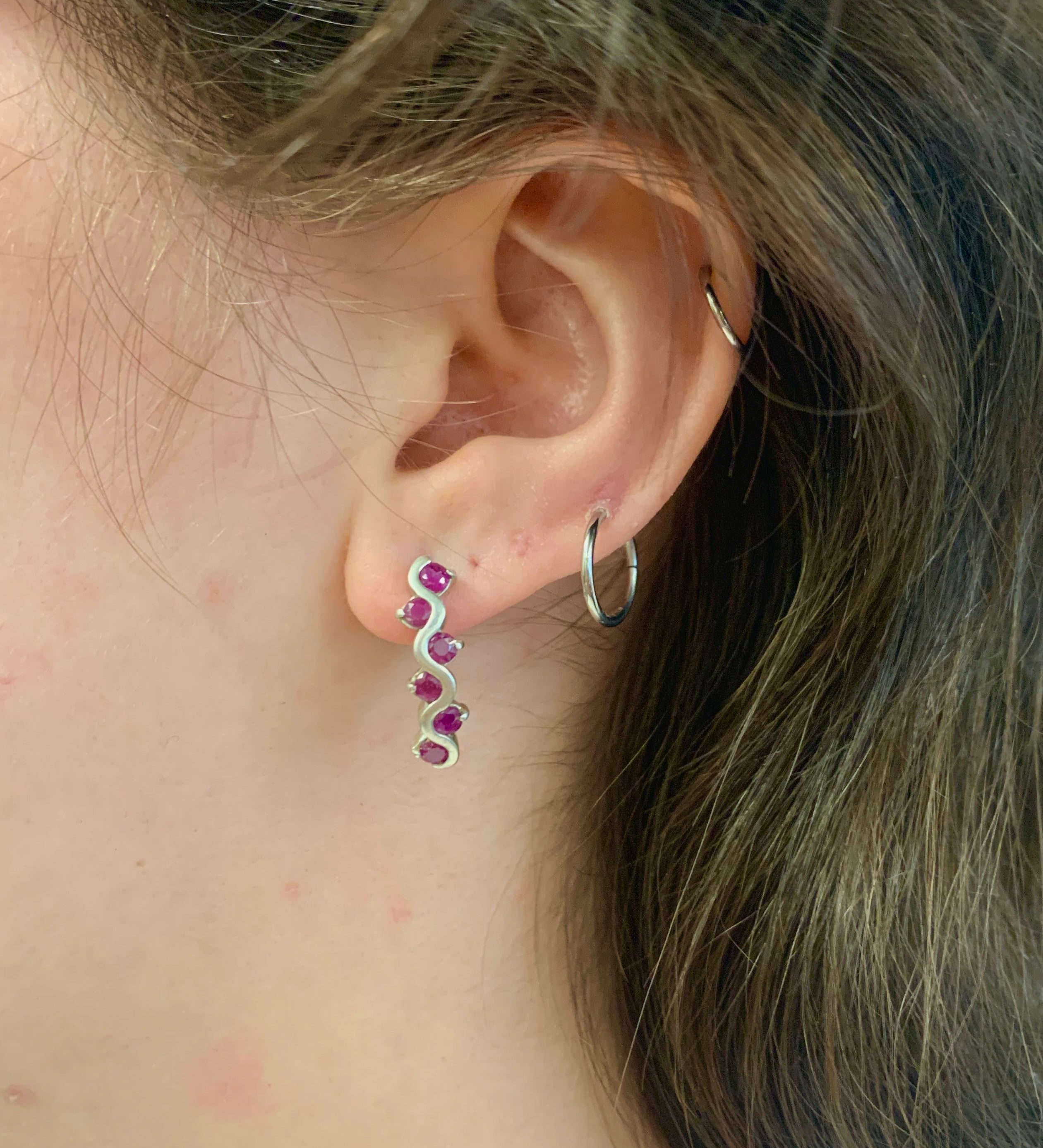 Elegant 925 Sterling Silver earrings featuring channel-set natural red rubies, perfect for birthdays and special occasions.