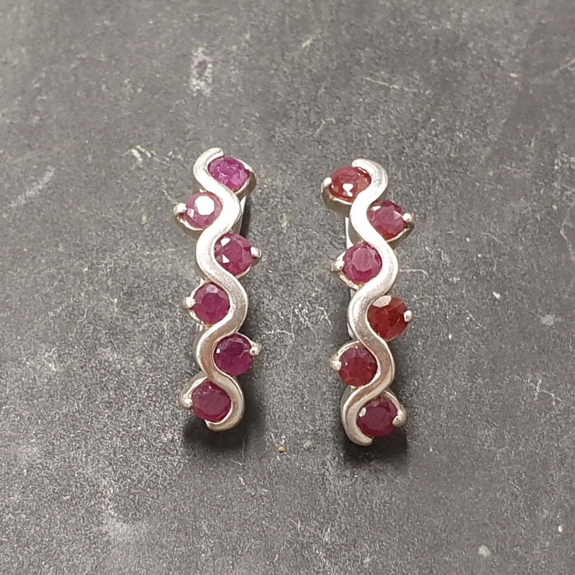 Natural Ruby Earrings made in 925 Sterling Silver with Round Natural Red Ruby in Channel-Set setting, July Birthstone gift idea, symbolizes nobility, purity, and passion, ideal for everyday wear and perfect for birthday gifting and special occasions.