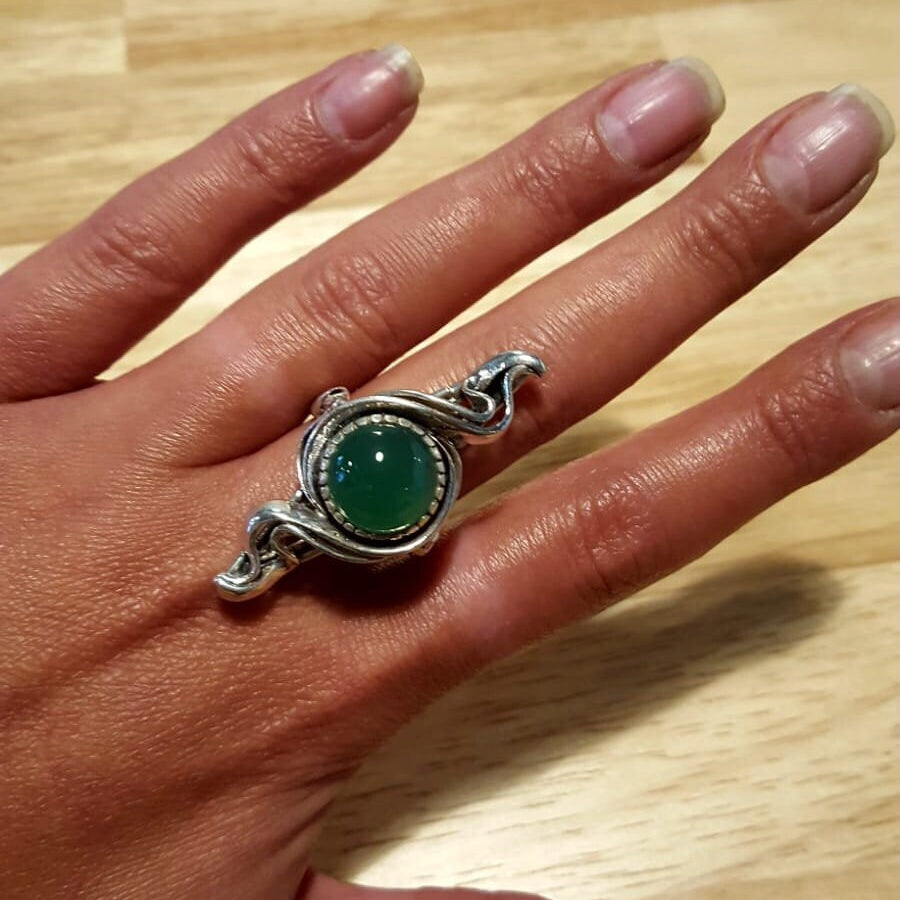 Elegant 925 Sterling Silver ring featuring a round created green emerald, perfect May birthstone gift for special occasions.