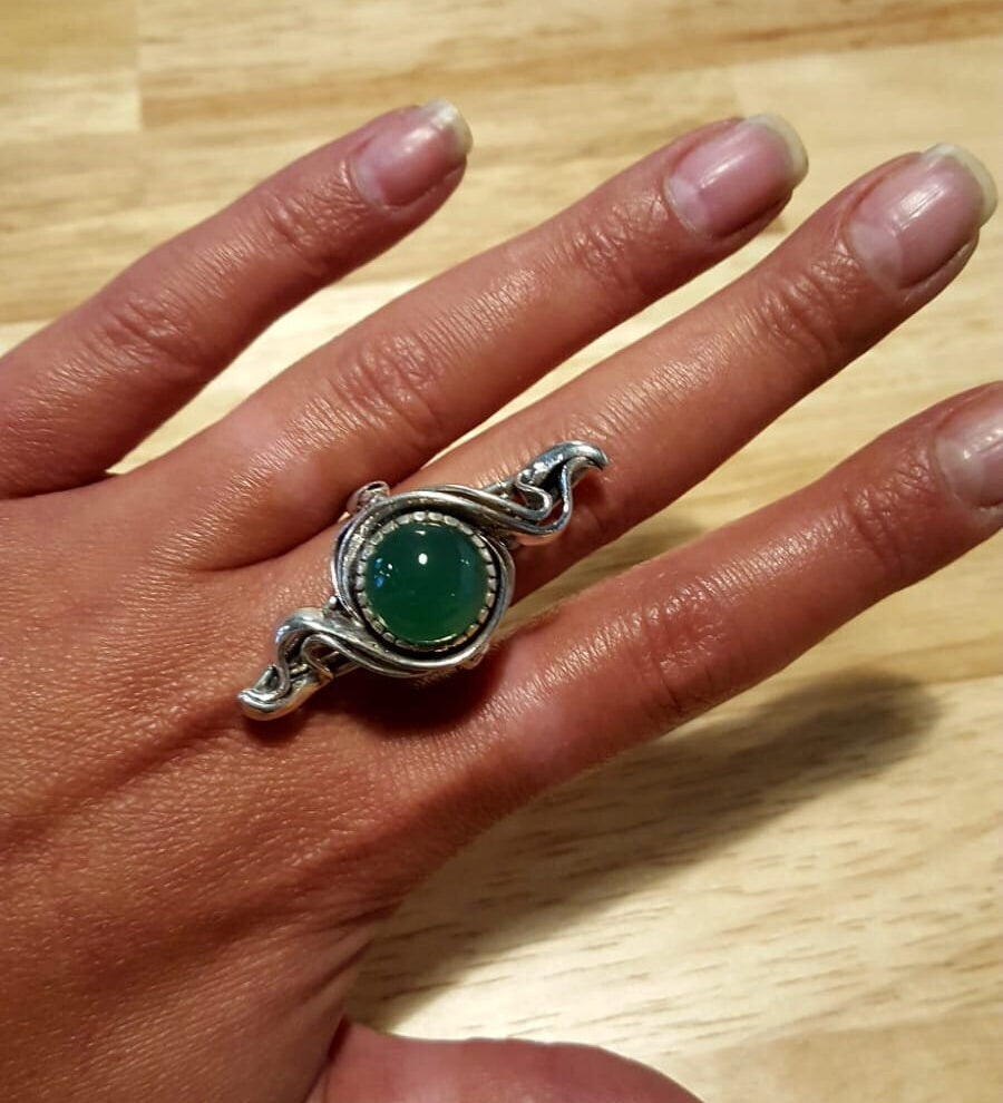 Elegant 925 Sterling Silver ring featuring a round created green emerald, perfect May birthstone gift for special occasions.