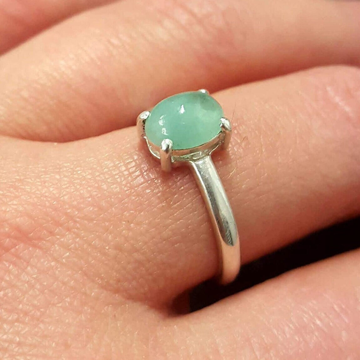 Charming 925 Sterling Silver ring with a beautiful prong-set Oval Natural Emerald, ideal for meaningful gifts and everyday elegance.