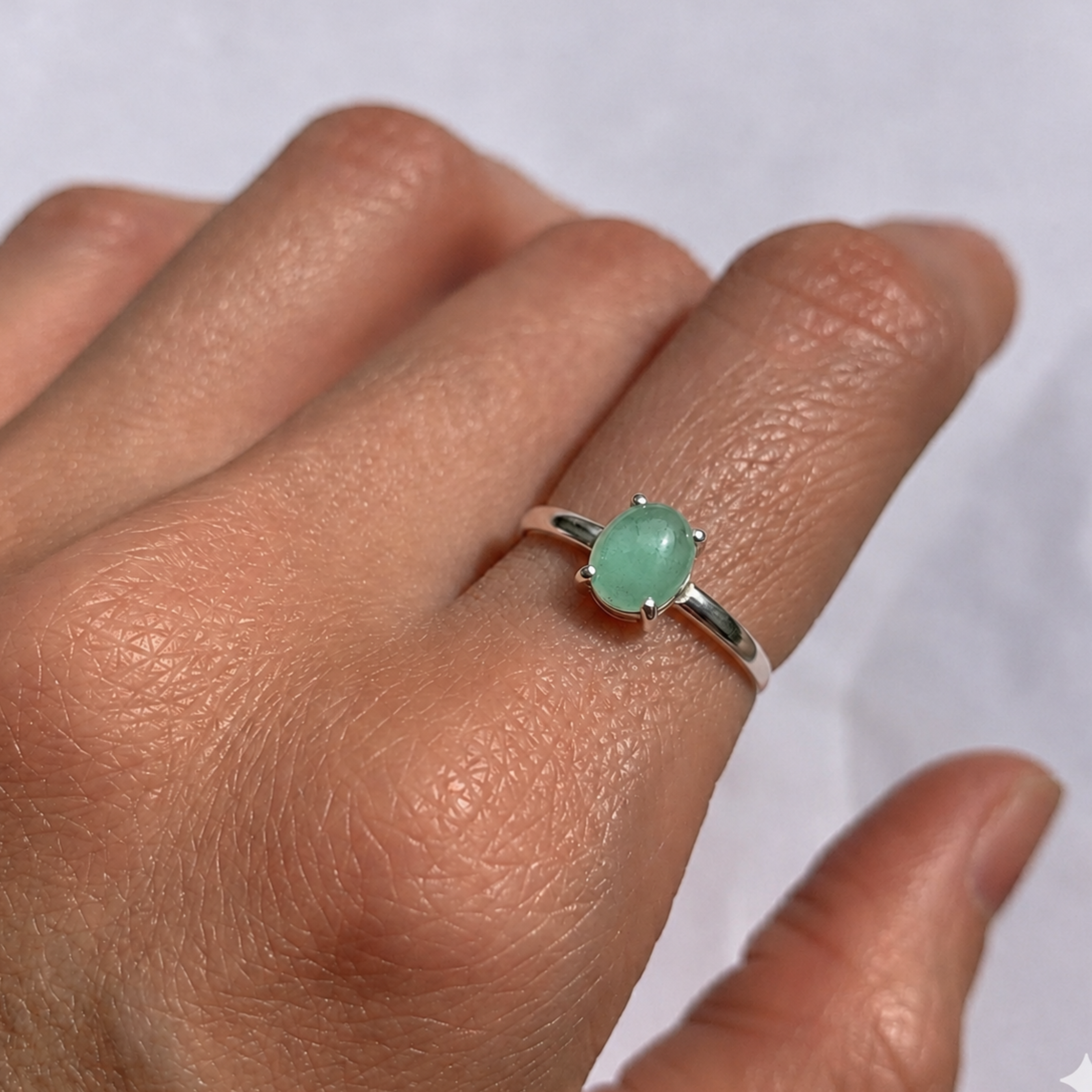 Elegant 925 Sterling Silver ring featuring a prong-set Oval Natural Emerald, perfect for May birthdays and special occasions.
