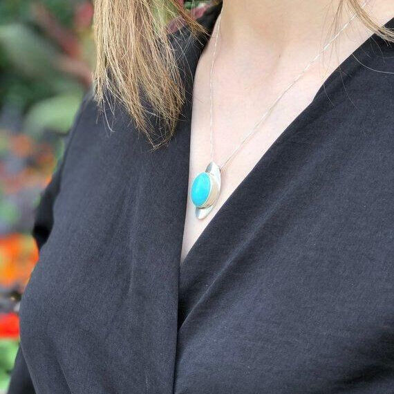 Sterling Silver Emerald Pendant with Oval Created Green Emerald, perfect for May birthdays and everyday elegance.