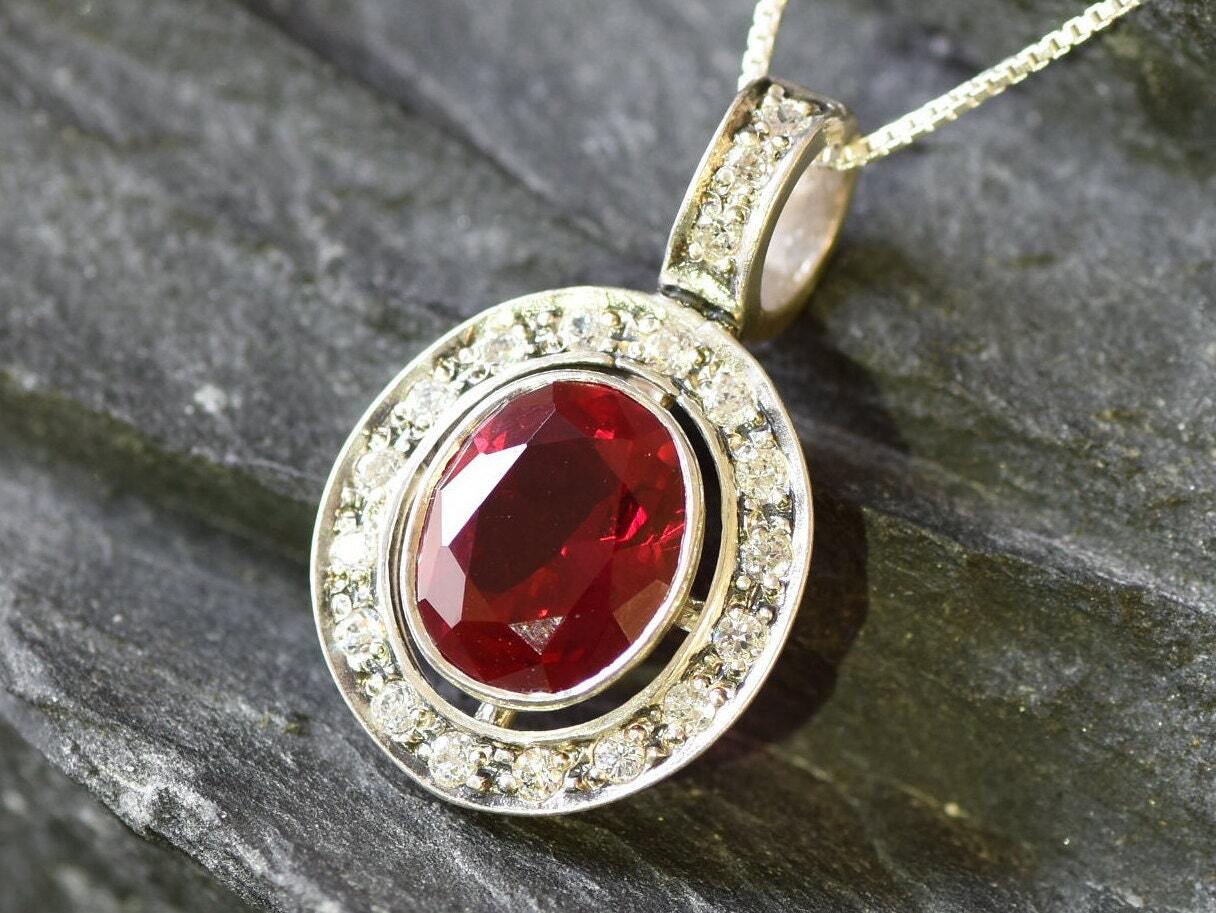 Ruby pendant in 925 Sterling Silver with bezel-set red ruby, perfect July birthday gift symbolizing passion and elegance.