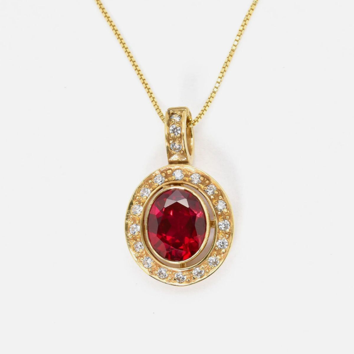 Created Ruby Pendant made in 18k Gold Vermeil with Oval Created Red Ruby in Bezel setting, July Birthstone gift idea, symbolizes nobility, purity, and passion, ideal for everyday wear and perfect for birthday gifting and special occasions.