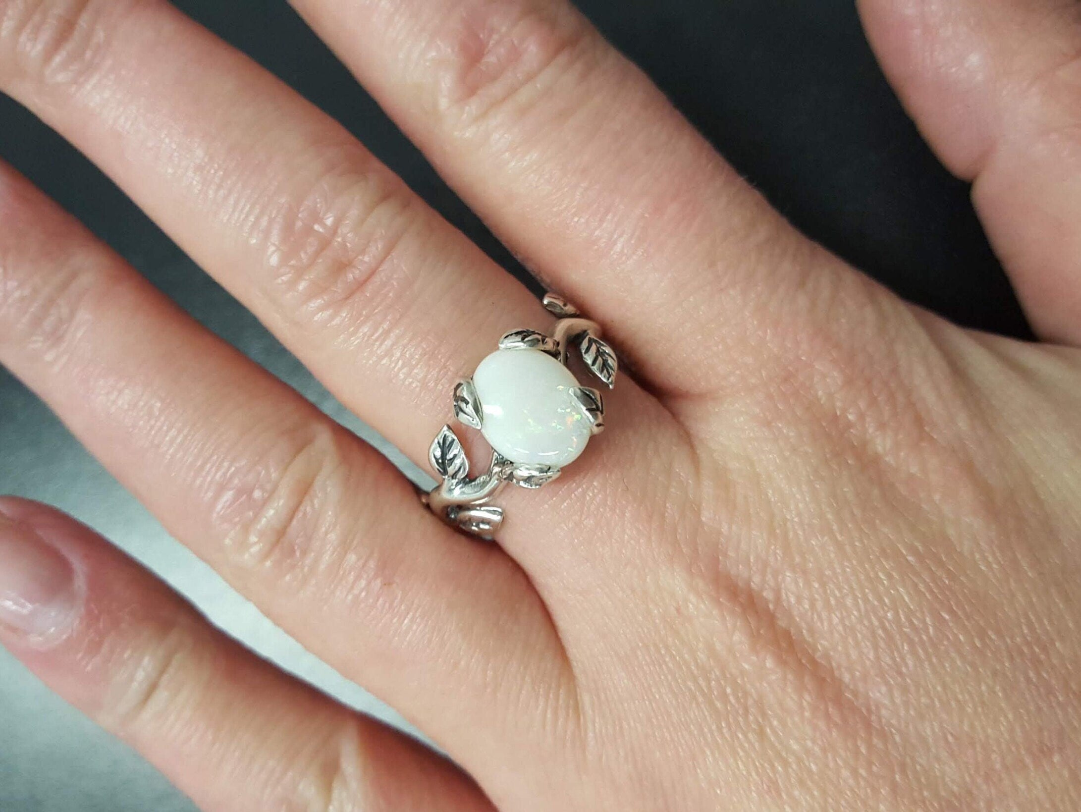 Elegant 925 Sterling Silver ring featuring an oval natural green emerald, perfect for May birthdays and meaningful gifts.