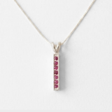 Natural Ruby Pendant made in 925 Sterling Silver with Round Natural Red Ruby in Channel-Set setting, July Birthstone gift idea, symbolizes nobility, purity, and passion, ideal for everyday wear and perfect for birthday gifting and special occasions.