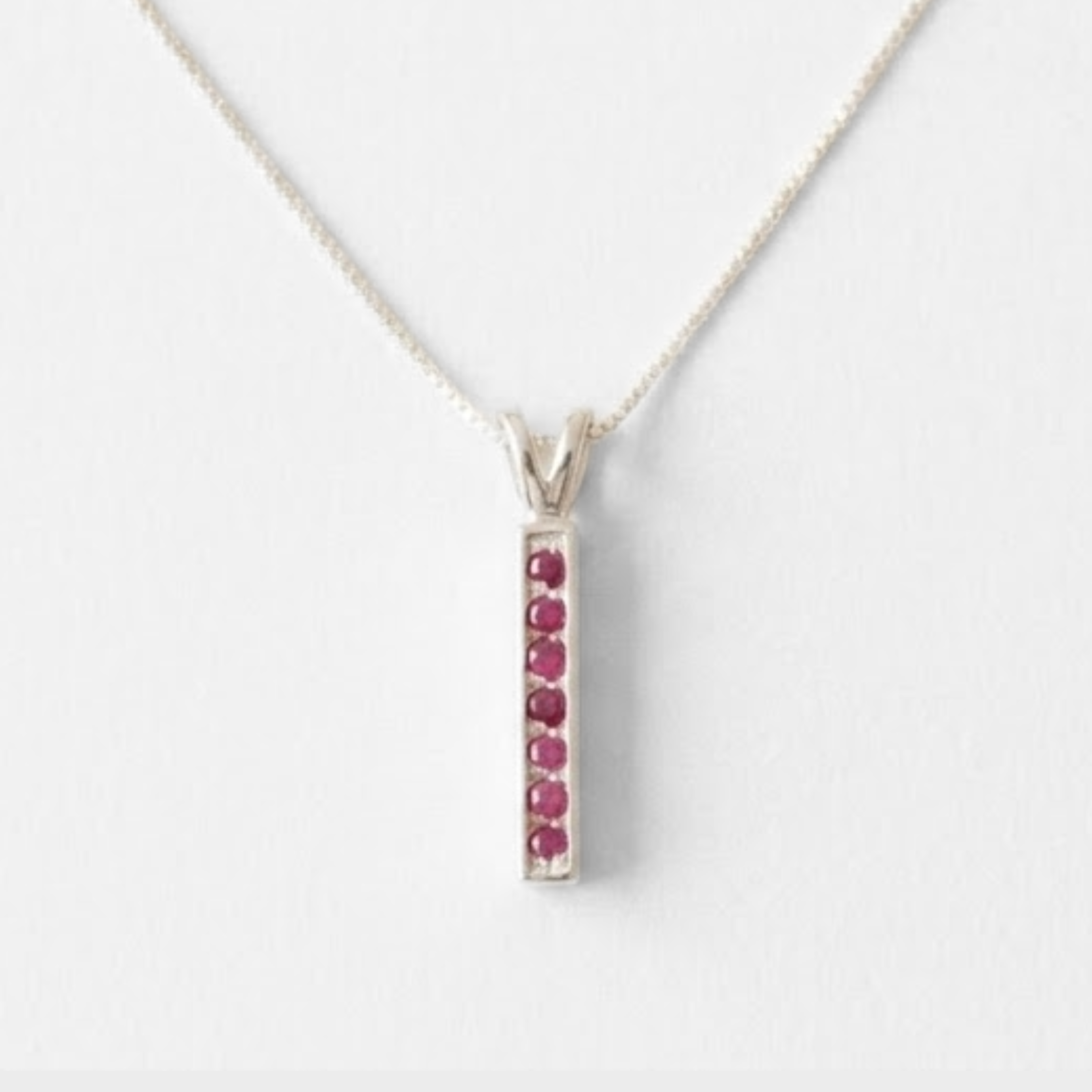 Natural Ruby Pendant made in 925 Sterling Silver with Round Natural Red Ruby in Channel-Set setting, July Birthstone gift idea, symbolizes nobility, purity, and passion, ideal for everyday wear and perfect for birthday gifting and special occasions.