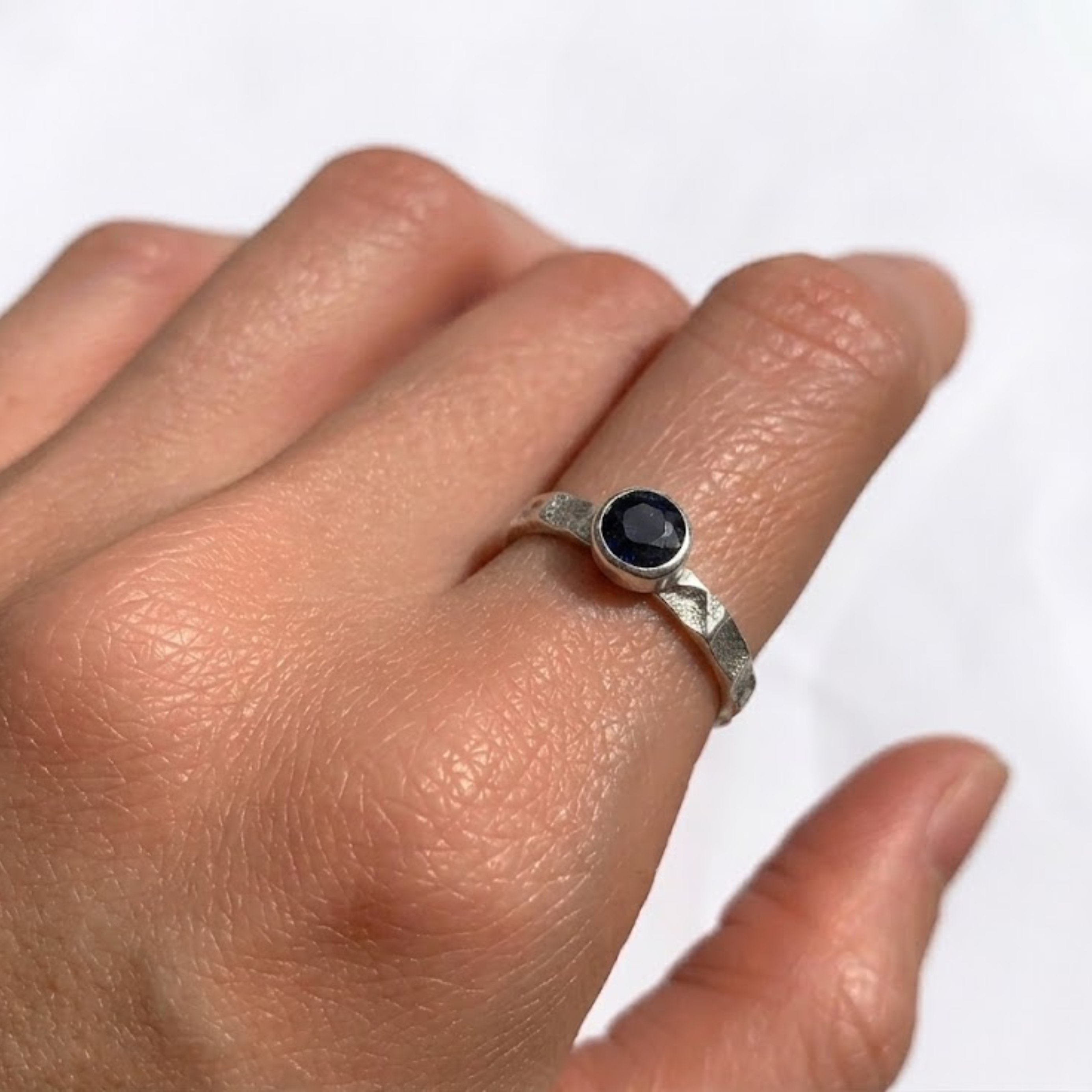 Elegant 925 Sterling Silver ring featuring a round blue sapphire, perfect September birthstone gift for any occasion.