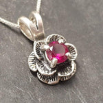 Striking 925 Sterling Silver Ruby Pendant featuring a round created ruby, a cherished piece for everyday elegance and July birthdays.