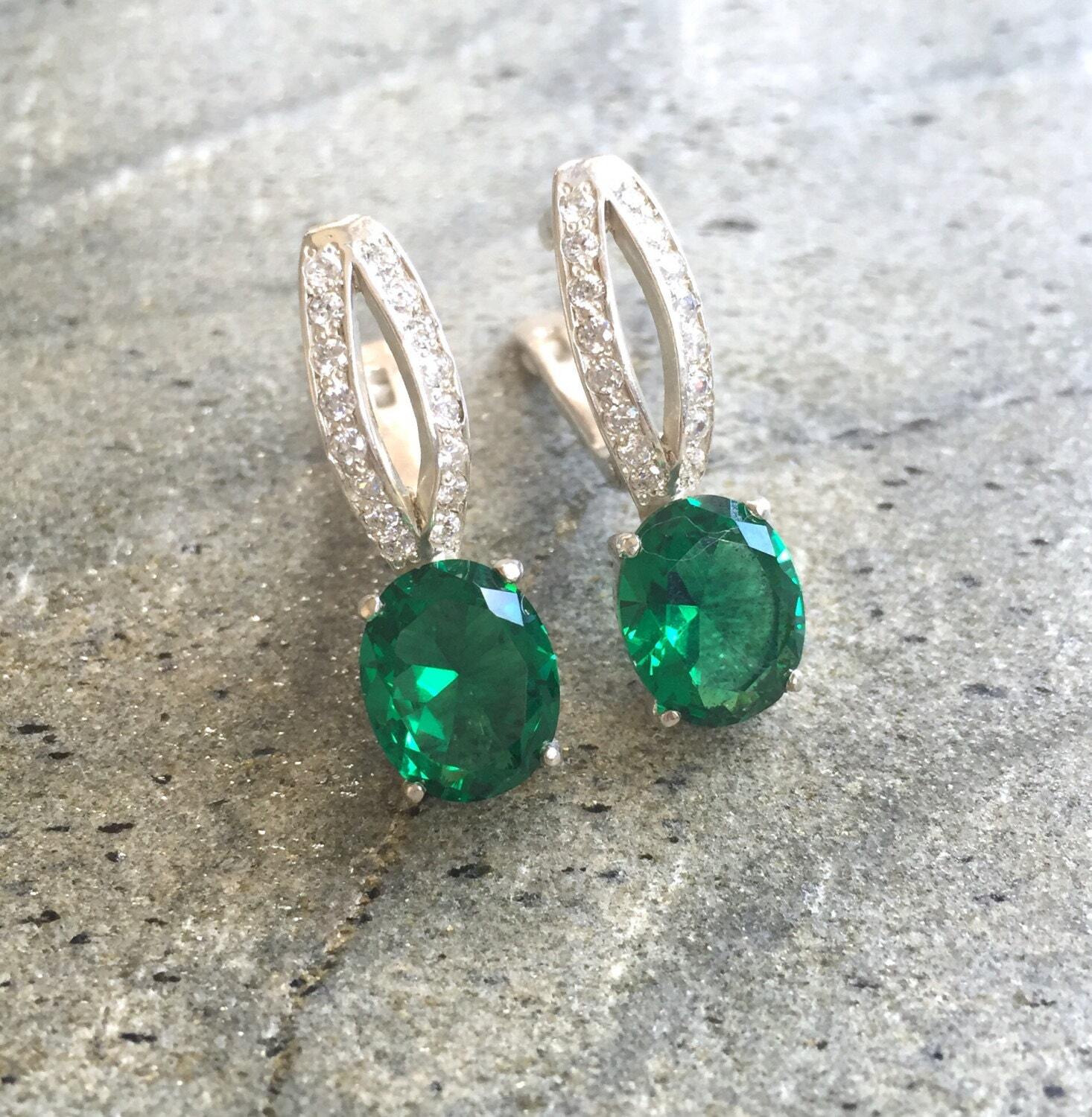 Created Emerald Earrings made in 925 Sterling Silver with Oval Created Green Emerald in Solitaire with Accents setting, May Birthstone gift idea, symbolizes, ideal for everyday wear and perfect for birthday gifting and special occasions.