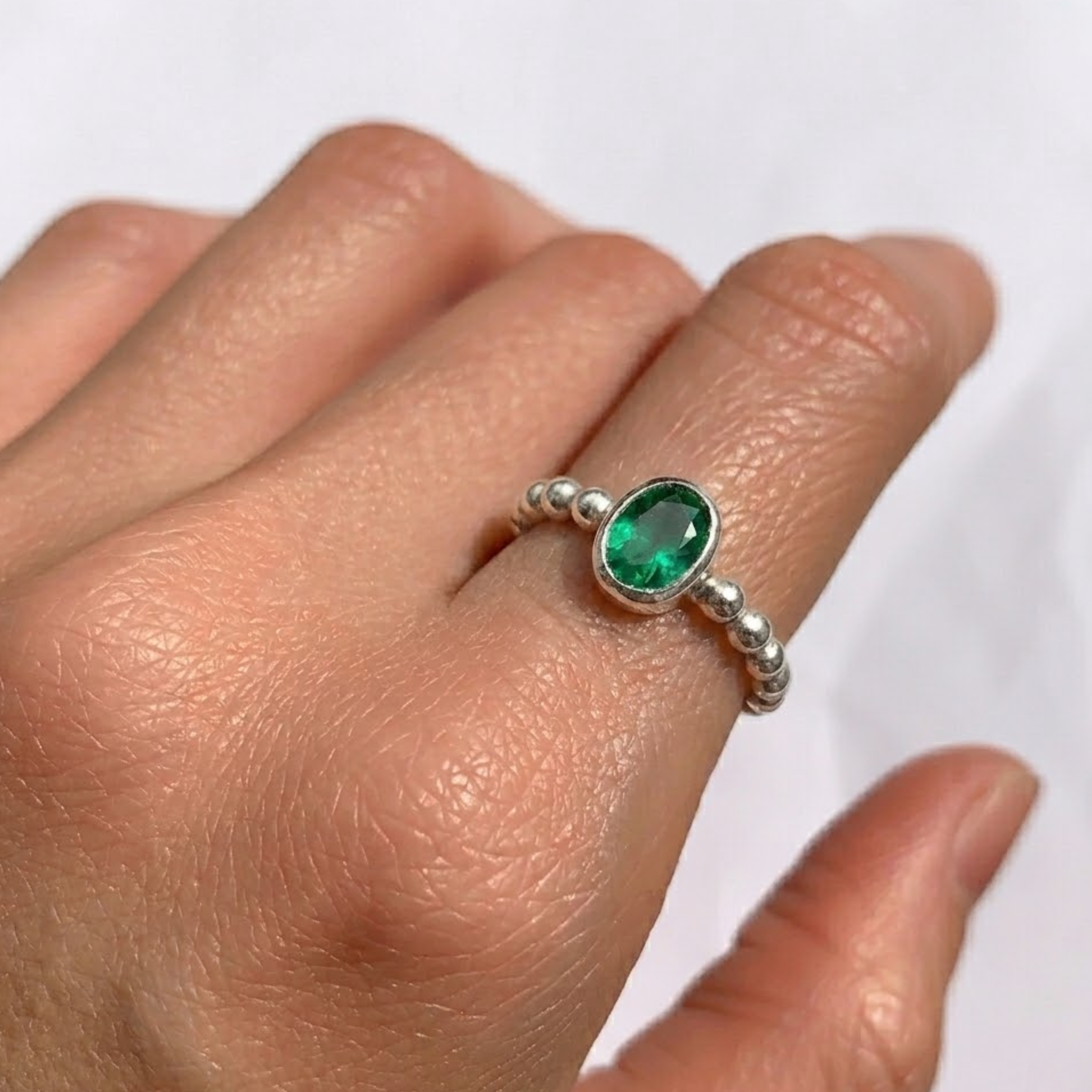Elegant 925 Sterling Silver ring featuring a stunning oval Created Green Emerald, ideal for birthdays and special occasions.