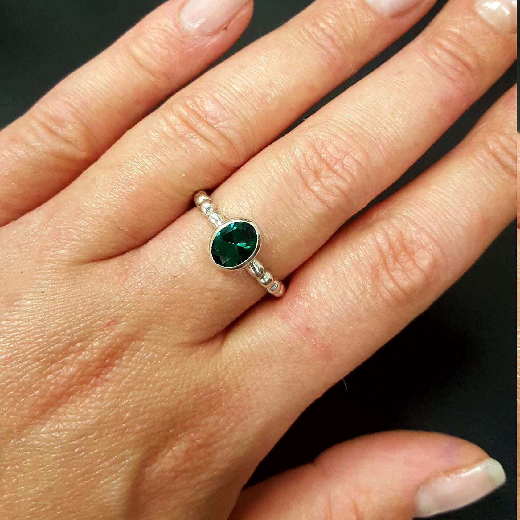 Elegant 925 Sterling Silver ring featuring a stunning oval Created Green Emerald, ideal for birthdays and special occasions.