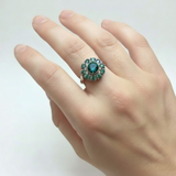 Vintage Green Diamond Ring - Intricate Flower Design in 925 Sterling Silver. A beautiful addition to any jewelry collection.