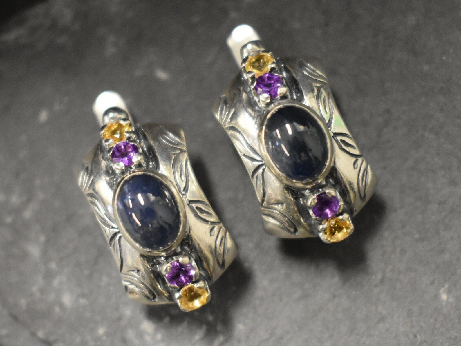 Natural Sapphire Earrings made in 925 Sterling Silver with Oval Natural Blue Sapphire in Bezel setting, September Birthstone gift idea, symbolizes sincerity, truth, and faithfulness, ideal for everyday wear and perfect for birthday gifting and special occasions.