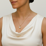 Stunning 18k Gold Vermeil Pendant with Oval Rainbow Moonstone, a versatile piece embodying protection and elegance for any occasion.