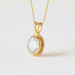 Lovely 18k Gold Vermeil Pendant with Rainbow Moonstone, a timeless piece that adds charm and symbolism to any outfit.