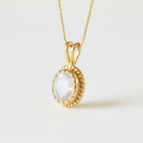 Lovely 18k Gold Vermeil Pendant with Rainbow Moonstone, a timeless piece that adds charm and symbolism to any outfit.