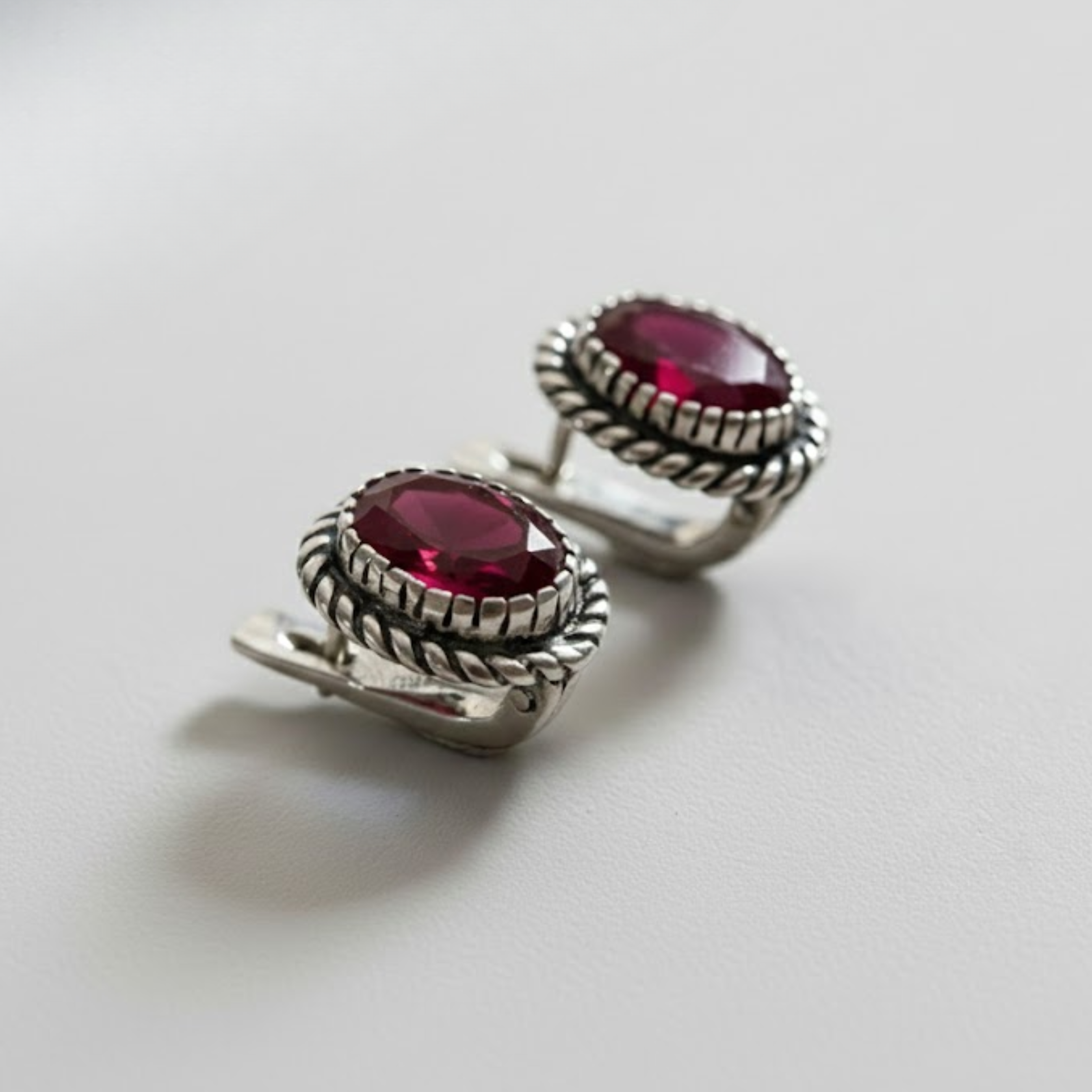 Stunning Created Ruby Earrings in 925 Sterling Silver, a lovely gift for July birthdays, symbolizing purity and devotion.