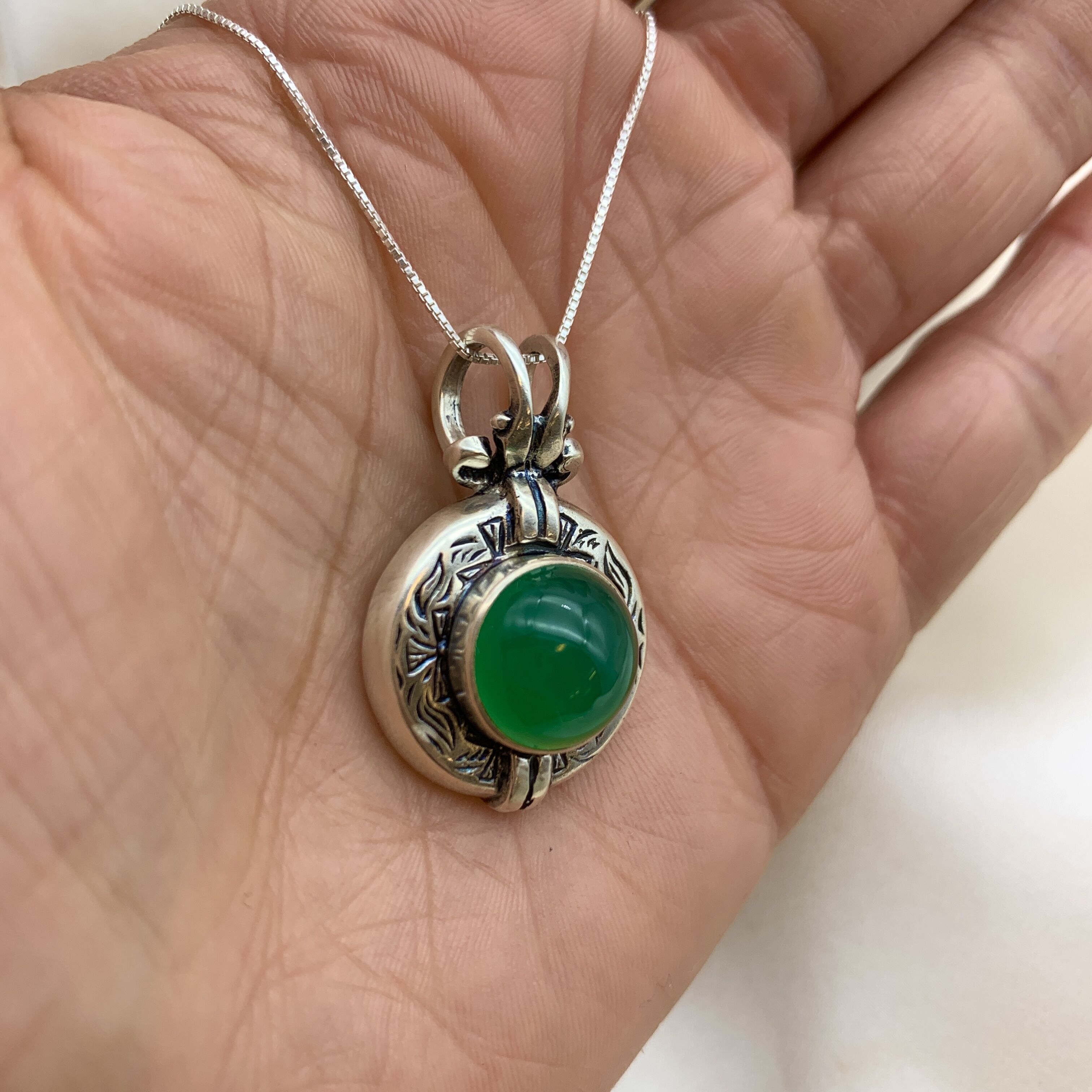 Created Emerald Pendant in 925 Sterling Silver, featuring a round green emerald; perfect gift for May birthdays and everyday wear.