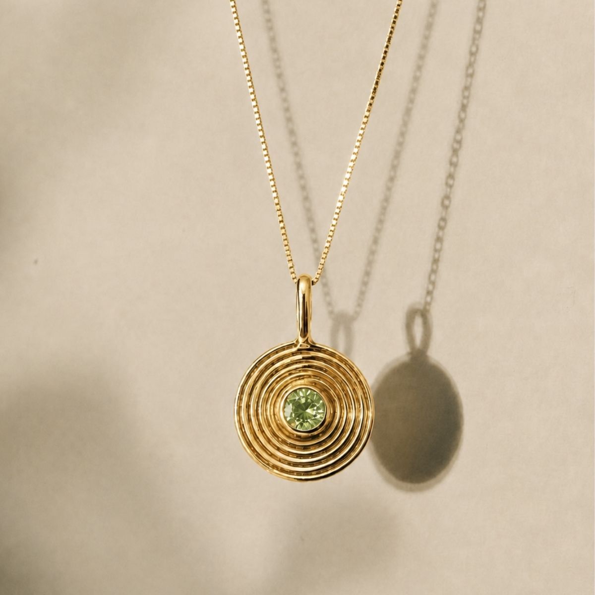 Natural peridot bezel pendant in 18k gold vermeil—symbolizing renewal and growth, perfect for birthdays or everyday wear