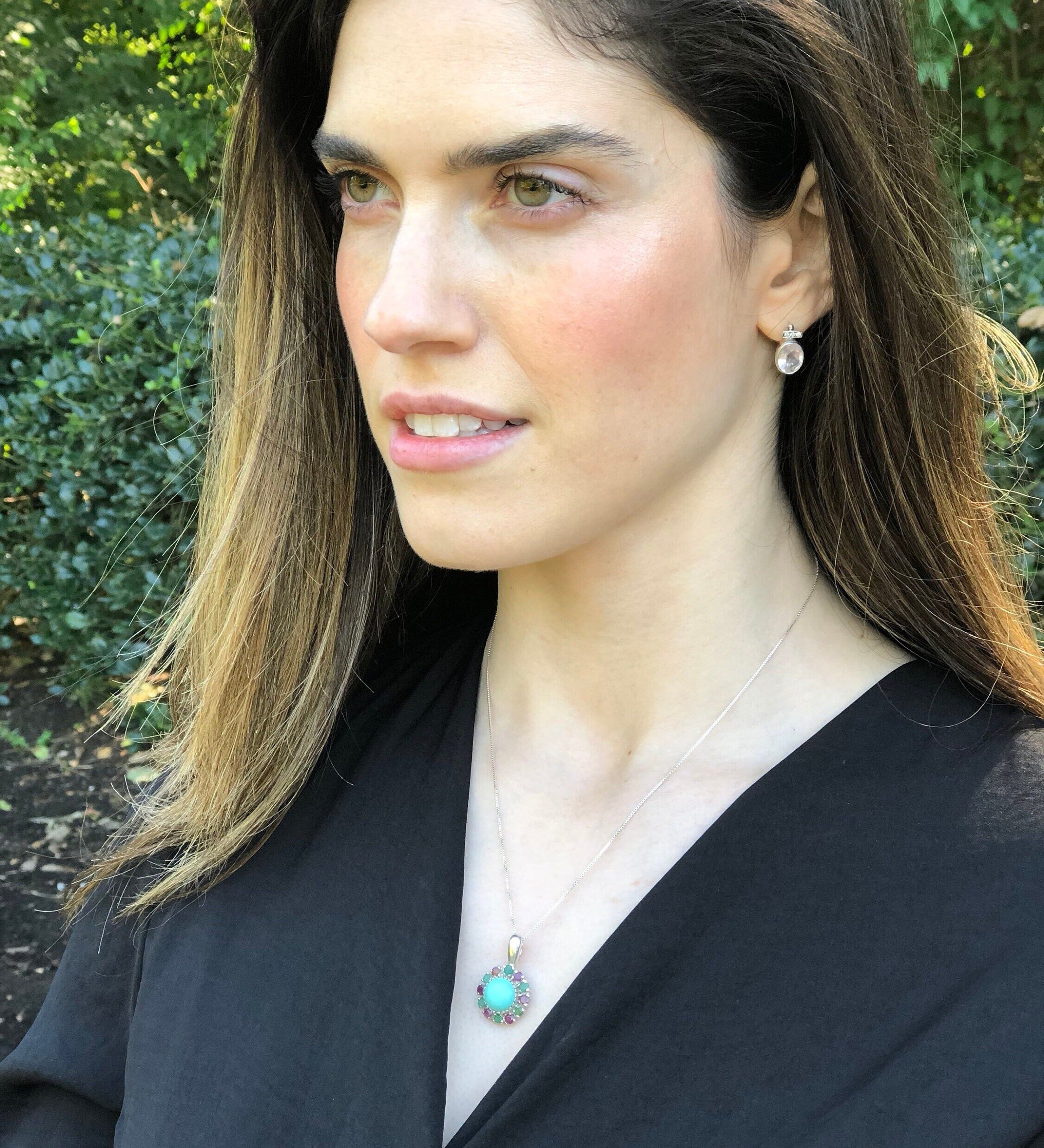 Elegant 925 Sterling Silver Emerald Pendant with a dazzling Round Created Green Emerald, perfect for May birthdays and special occasions.