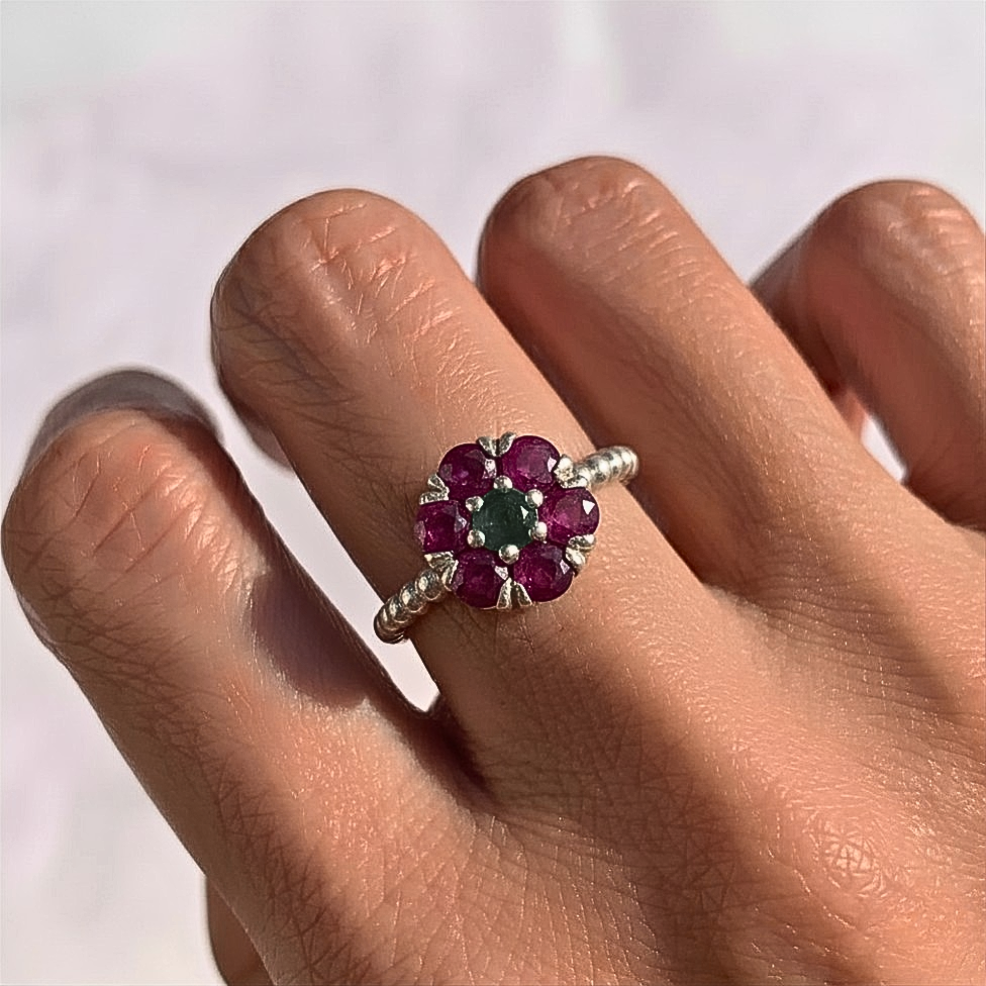 Elegant 925 Sterling Silver ring featuring a vibrant round natural red ruby, perfect for July birthdays and special occasions.
