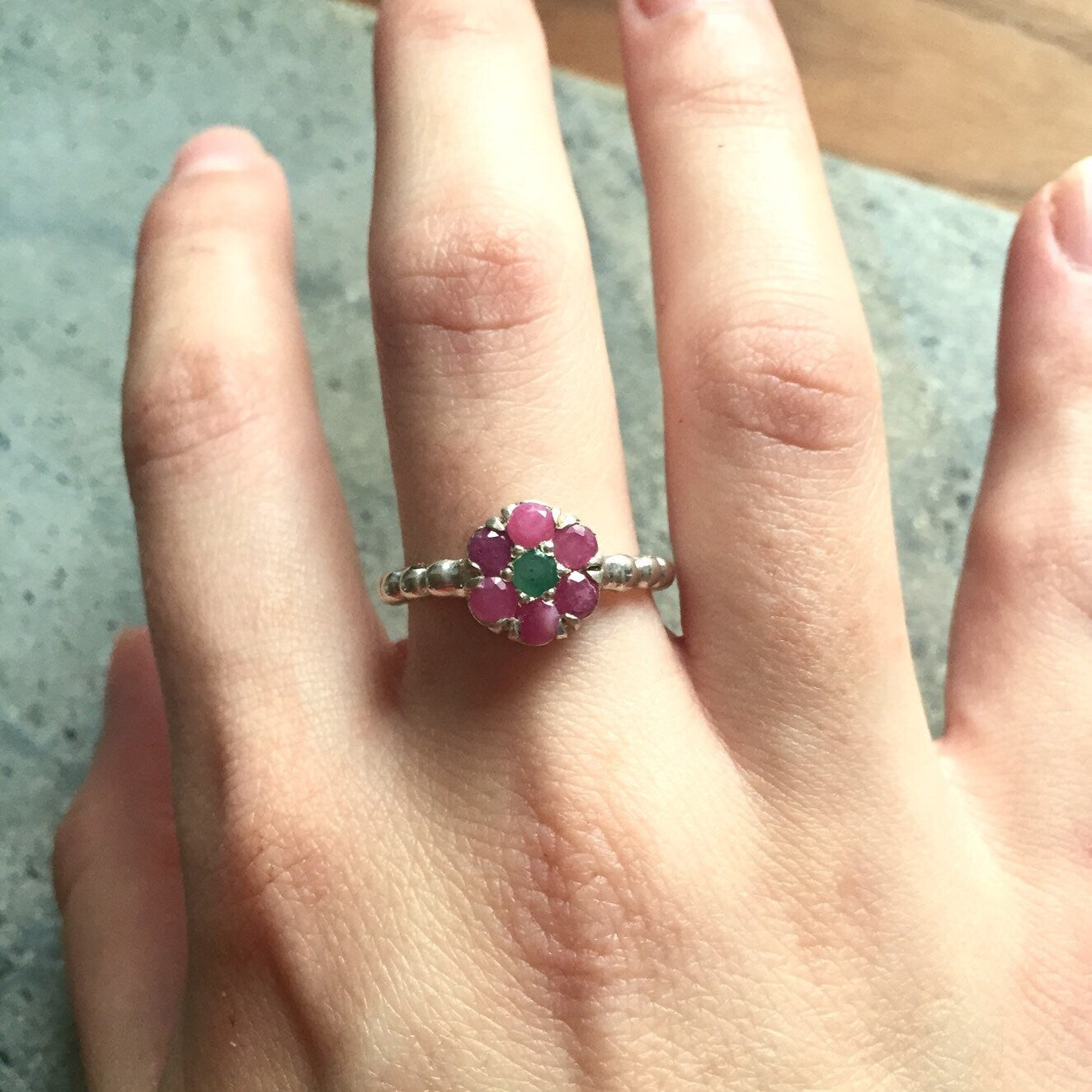 Elegant 925 Sterling Silver ring featuring a vibrant round natural red ruby, perfect for July birthdays and special occasions.