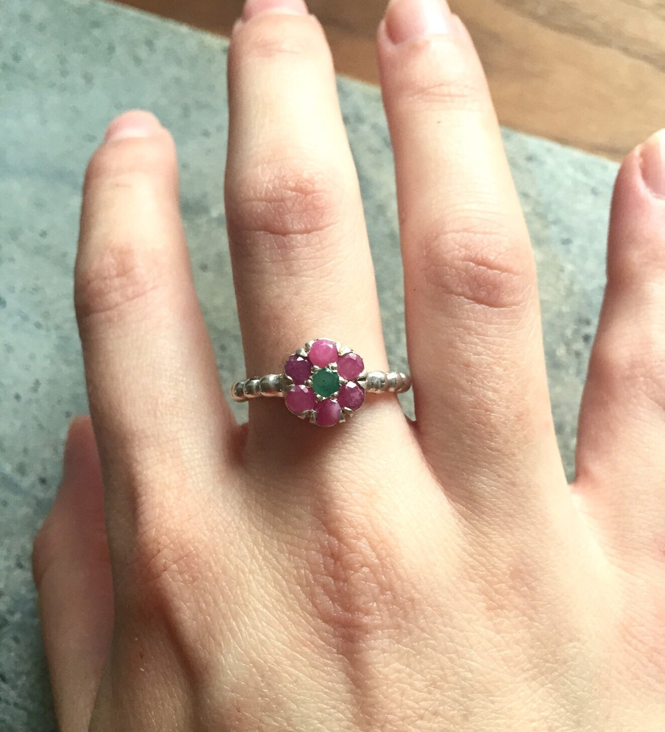 Elegant 925 Sterling Silver ring featuring a vibrant round natural red ruby, perfect for July birthdays and special occasions.