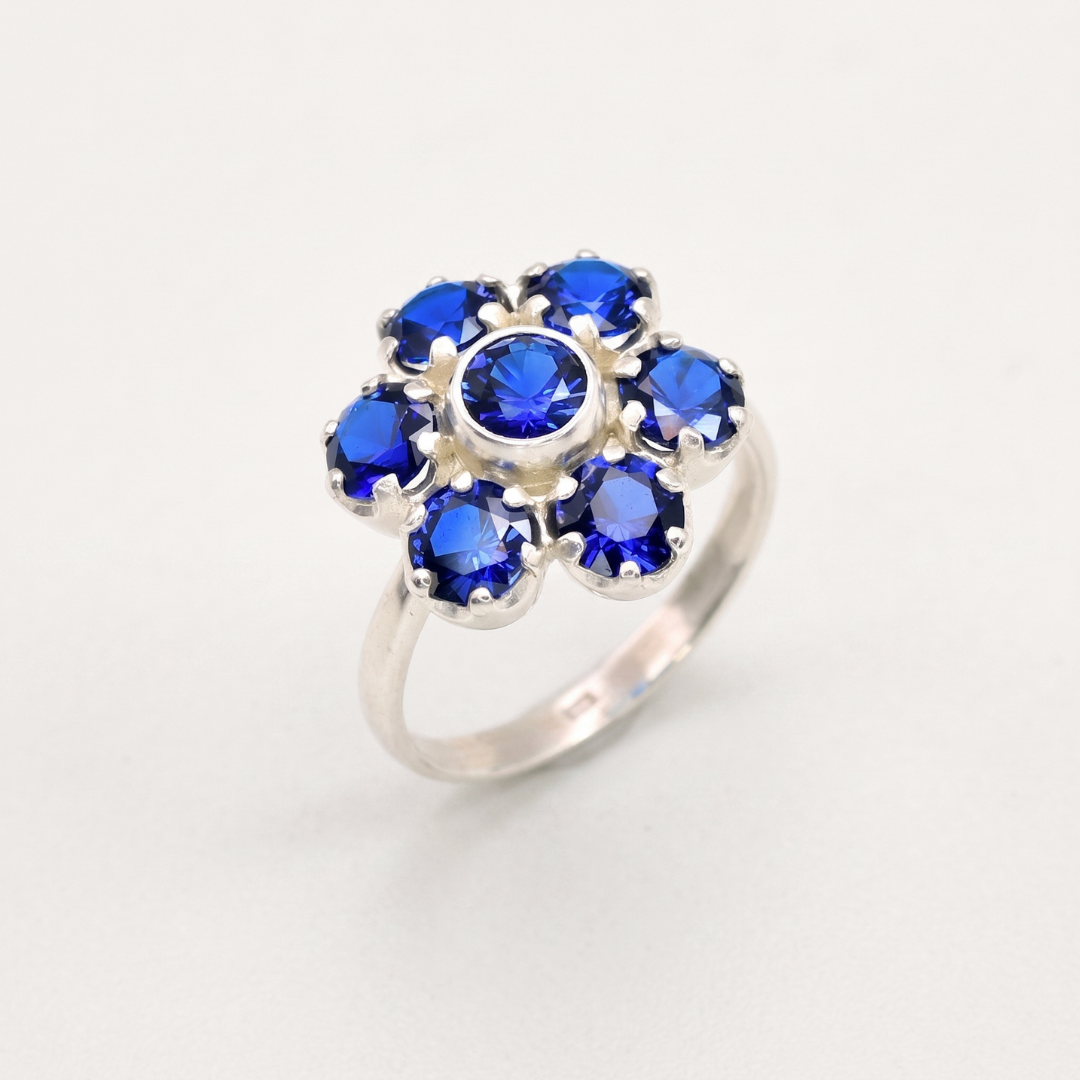 Created Sapphire Ring made in 925 Sterling Silver with Round Created Blue Sapphire in Cluster setting, September Birthstone gift idea, symbolizes sincerity, truth, and faithfulness, ideal for everyday wear and perfect for birthday gifting and special occasions.