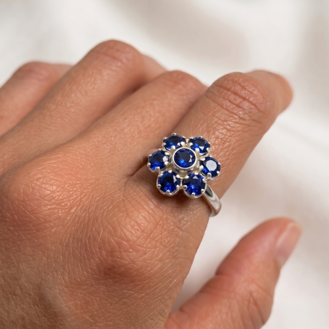 Cluster setting created sapphire ring in 925 Sterling Silver, September birthstone symbolizing faithfulness and sincerity.