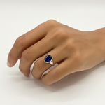 Crafted in sterling silver, this bezel-set created sapphire ring is ideal for daily wear and symbolizes loyalty and truth.