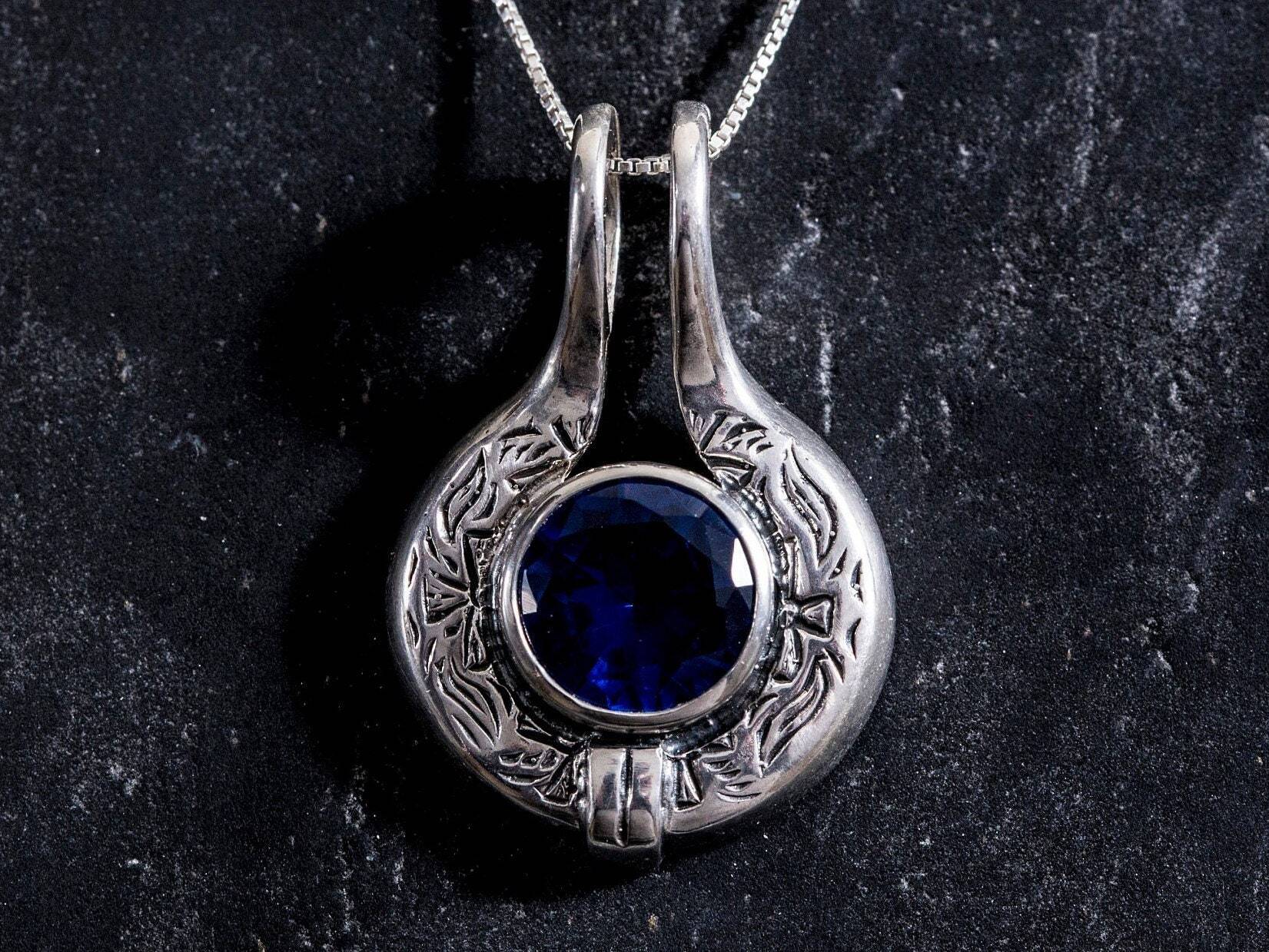 Created Sapphire Pendant made in 925 Sterling Silver with Round Created Blue Sapphire in Bezel setting, September Birthstone gift idea, symbolizes sincerity, truth, and faithfulness, ideal for everyday wear and perfect for birthday gifting and special occasions.