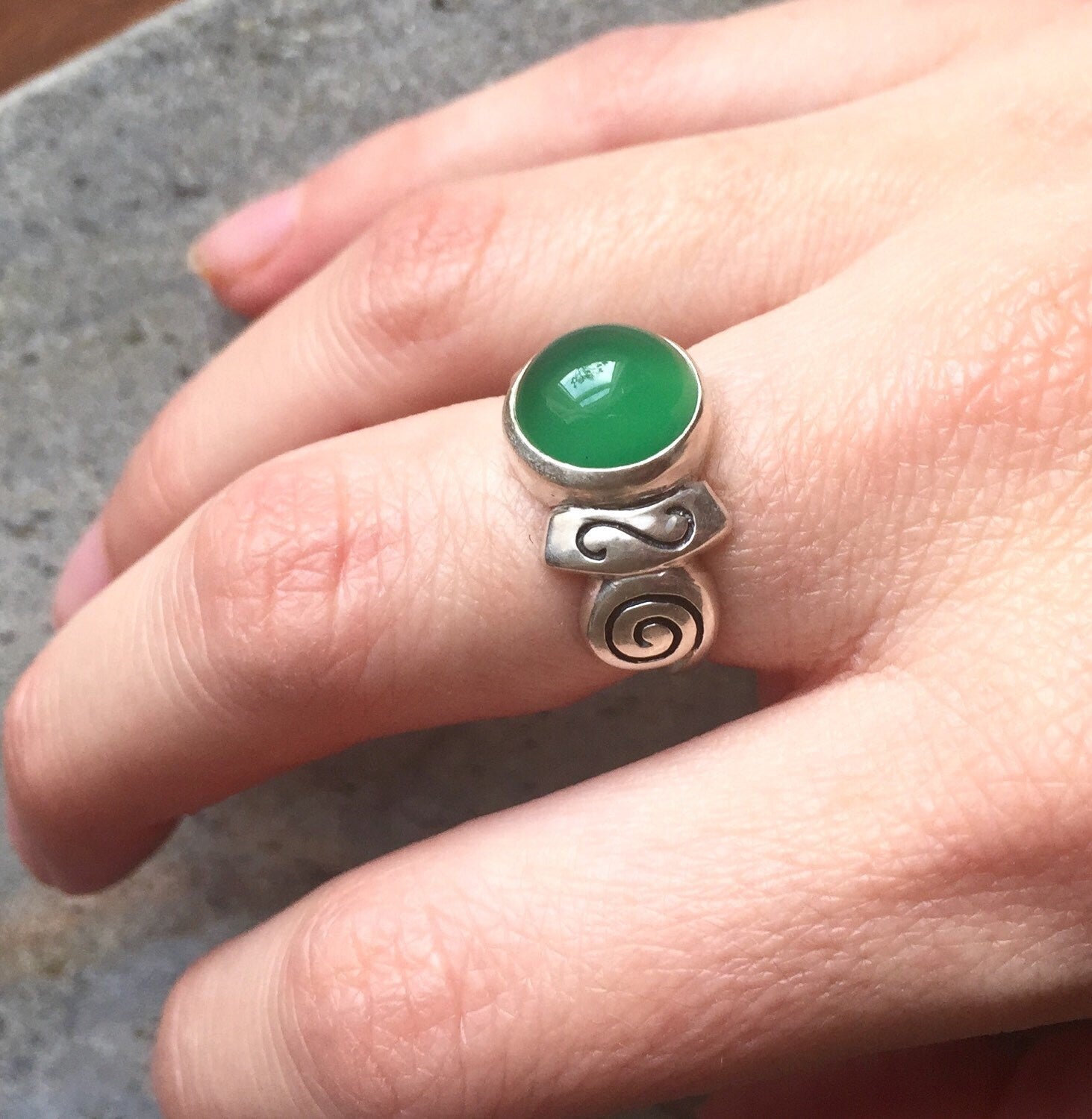Elegant 925 Sterling Silver ring featuring a round Created Green Emerald, perfect for May birthdays and special occasions.