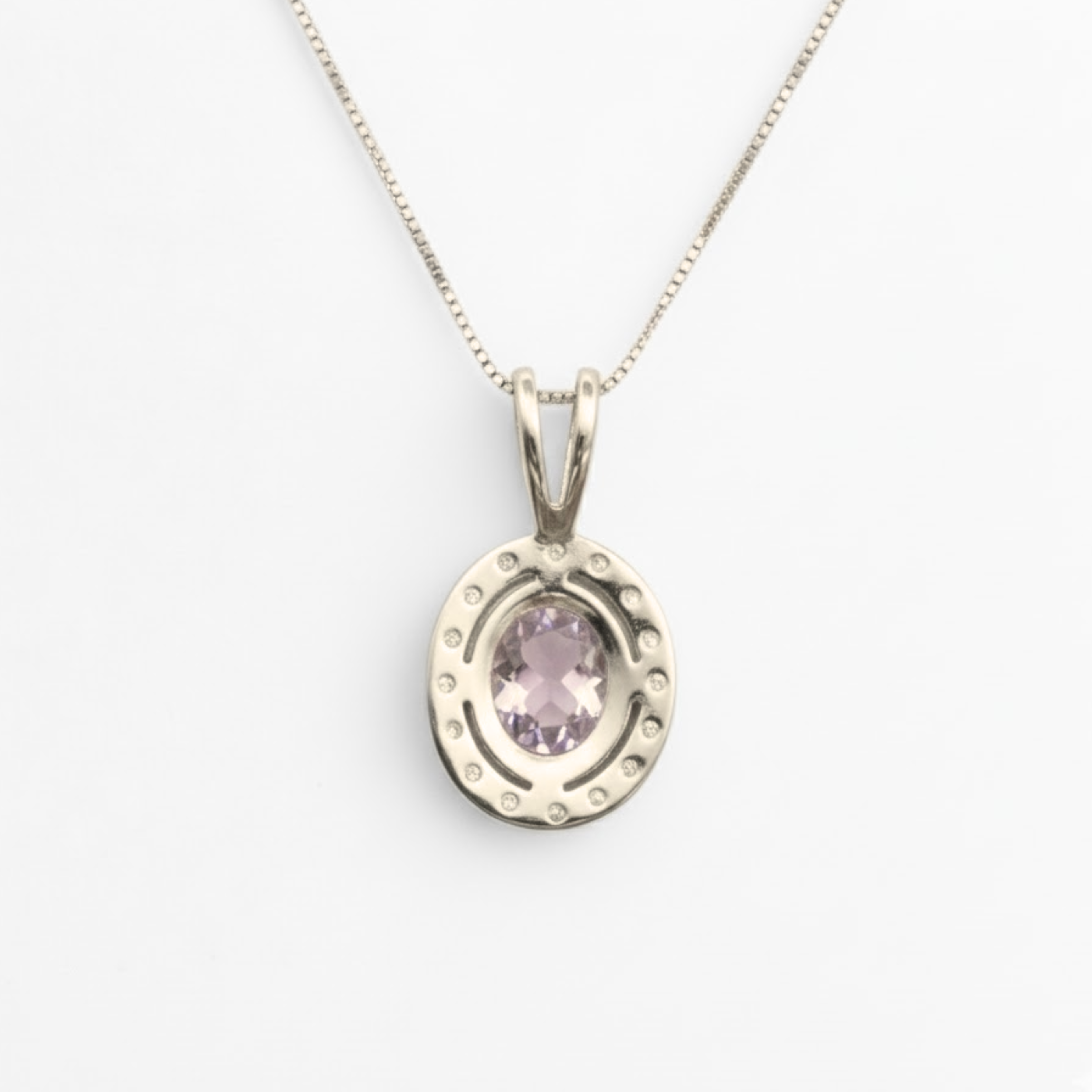 A stylish flat lay of Adina Stone earrings arranged on a marble surface, highlighting their intricate designs and colors.