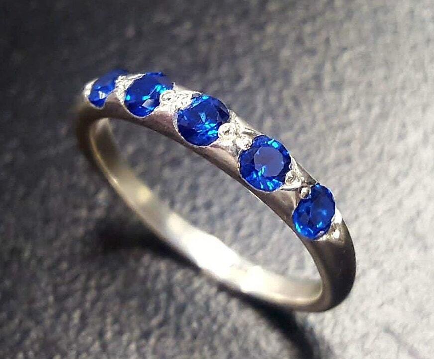 Created Sapphire Ring made in 925 Sterling Silver with Round Created Blue Sapphire in Channel-Set setting, September Birthstone gift idea, symbolizes sincerity, truth, and faithfulness, ideal for everyday wear and perfect for birthday gifting and special occasions.