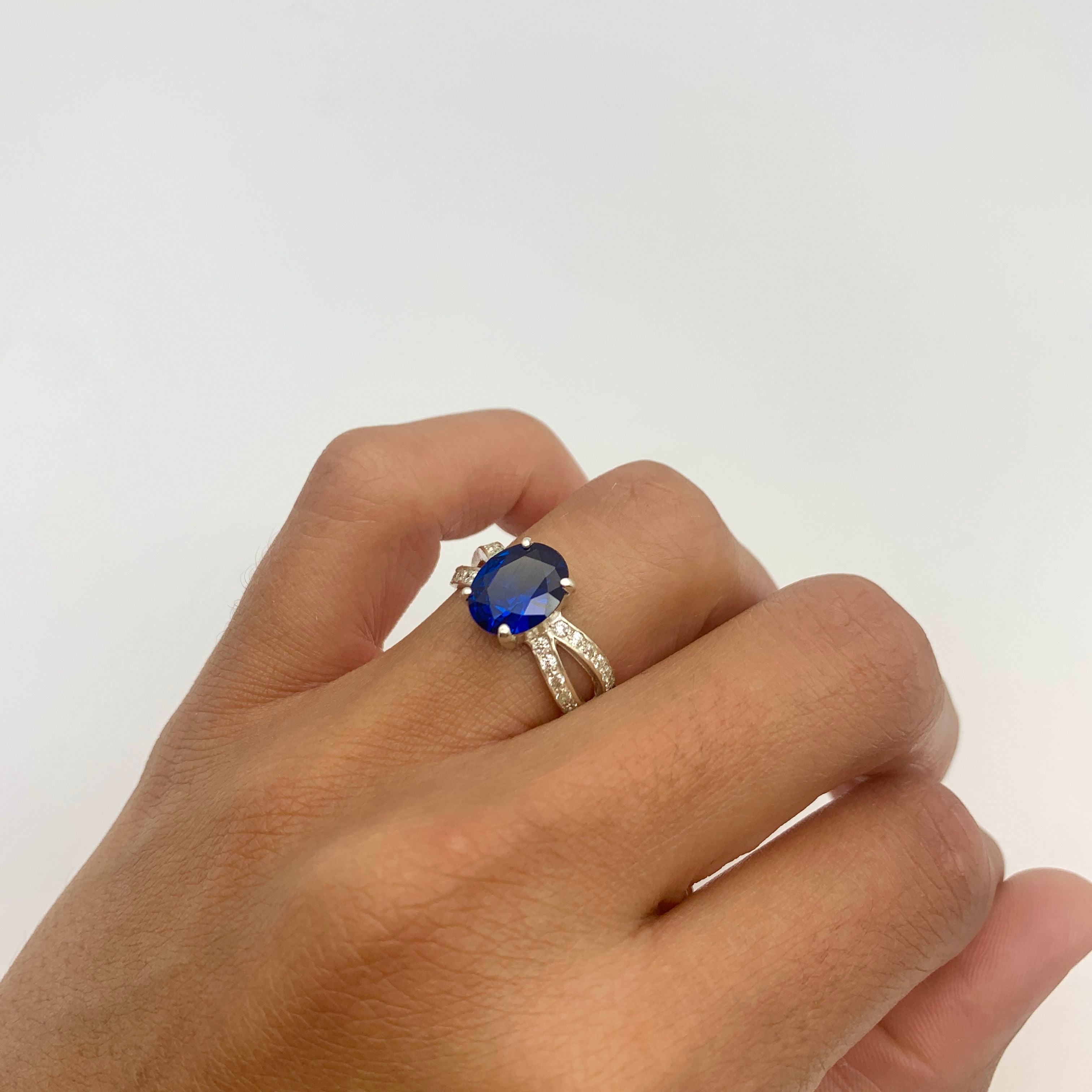Elegant 925 Sterling Silver ring featuring an oval Created Blue Sapphire, ideal for September birthdays and special occasions.