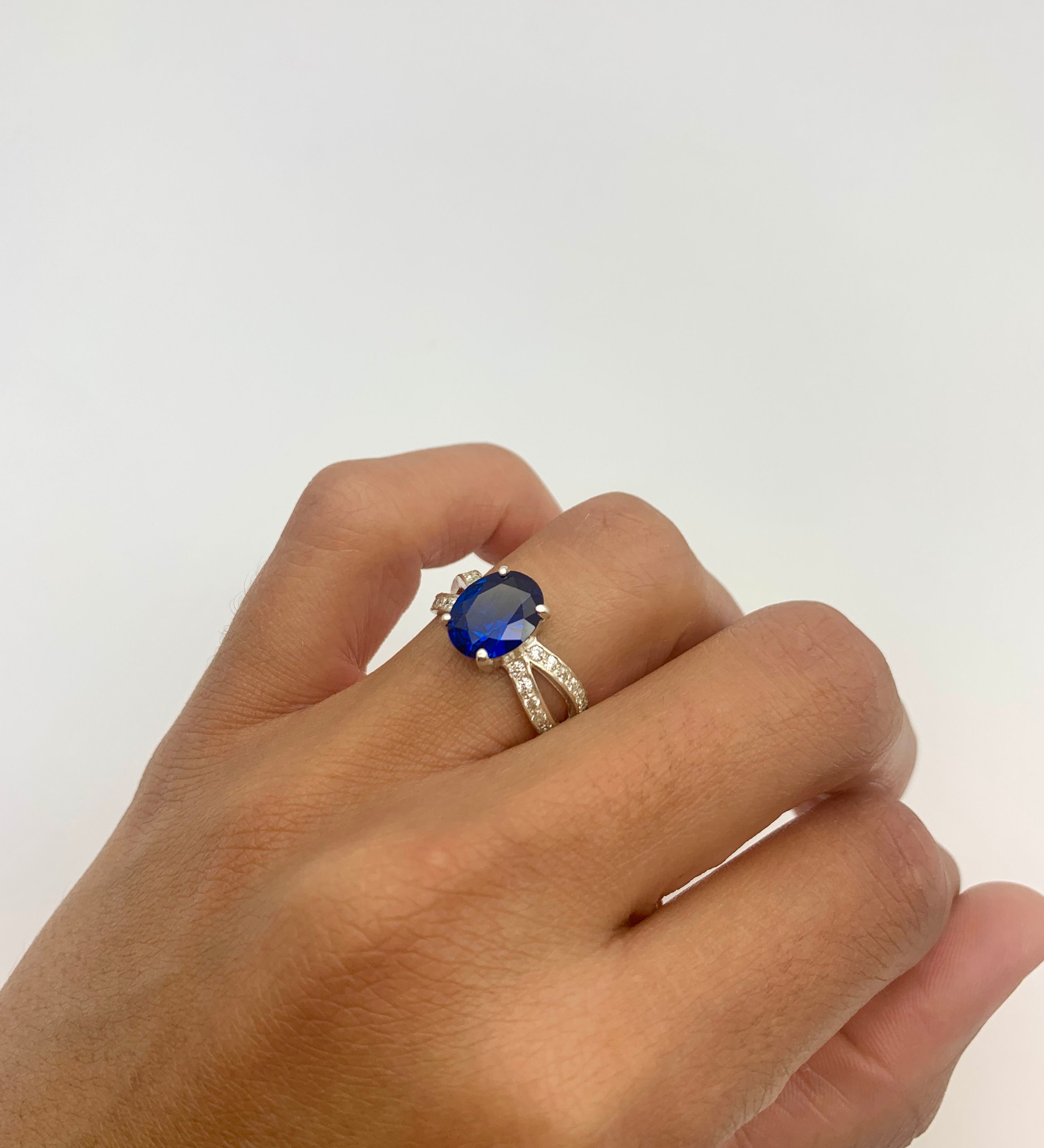 Elegant 925 Sterling Silver ring featuring an oval Created Blue Sapphire, ideal for September birthdays and special occasions.