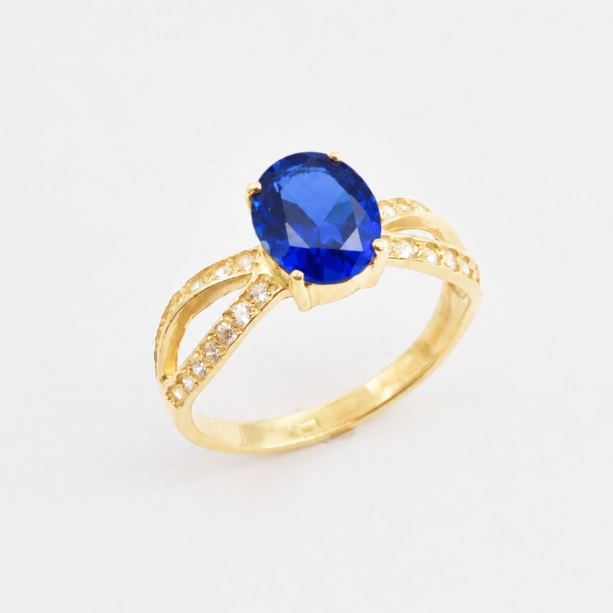 Created Sapphire Ring made in 18k Gold Vermeil with Oval Created Blue Sapphire in Solitaire with Accents setting, September Birthstone gift idea, symbolizes sincerity, truth, and faithfulness, ideal for everyday wear and perfect for birthday gifting and special occasions.