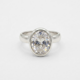 Timeless 925 sterling silver bezel solitaire ring with diamond, minimalist band ideal for daily wear and gifting.