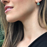 Beautiful 925 Sterling Silver earrings showcasing natural Green Emeralds, representing growth and harmony for special moments.