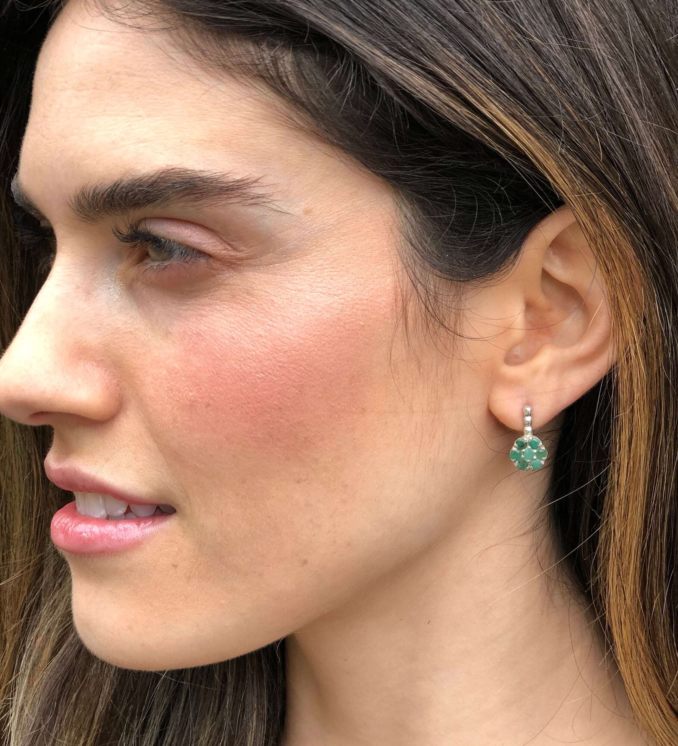 Elegant 925 Sterling Silver earrings featuring a stunning cluster of natural Green Emeralds, perfect for May birthdays and special occasions.