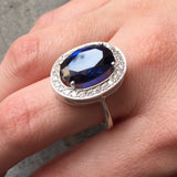 925 Sterling Silver ring featuring an Oval Created Blue Sapphire, perfect for September birthdays and everyday elegance.