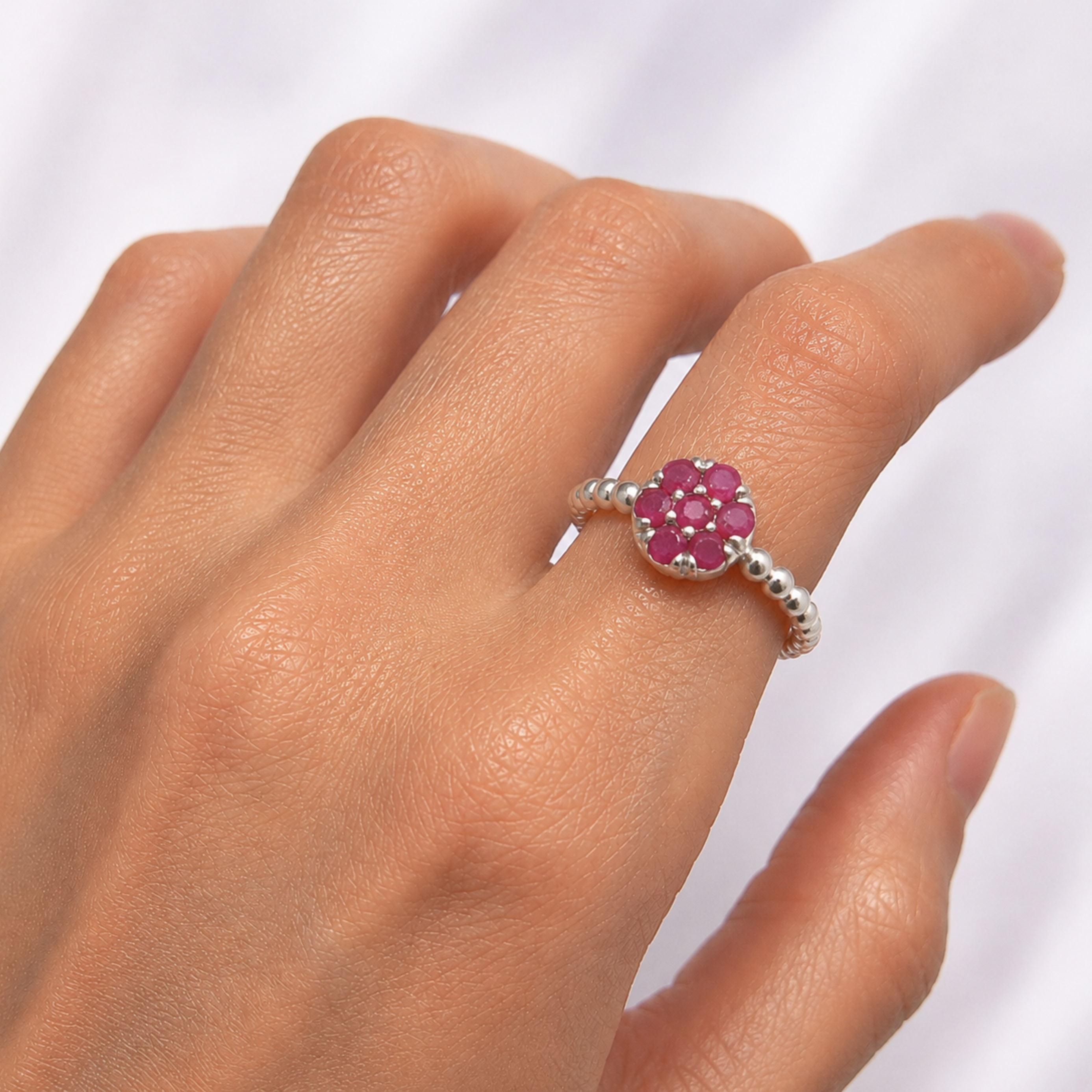 Elegant 925 Sterling Silver Ruby Ring with Red Ruby in Cluster setting, symbolizing passion and nobility, perfect for special occasions.
