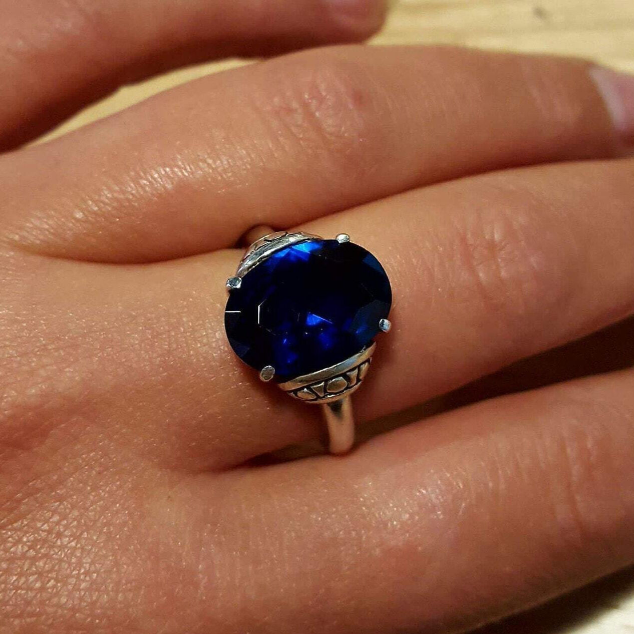 Elegant 925 Sterling Silver ring featuring an Oval Created Blue Sapphire, perfect for birthdays and special occasions.