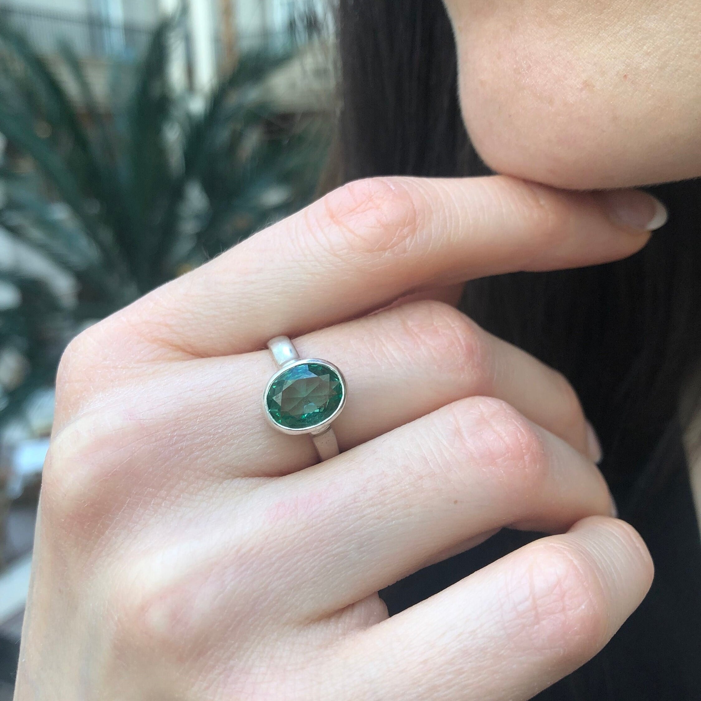 Elegant 925 Sterling Silver ring featuring Created Mint Emerald in Bezel setting, perfect for May birthdays and special occasions.