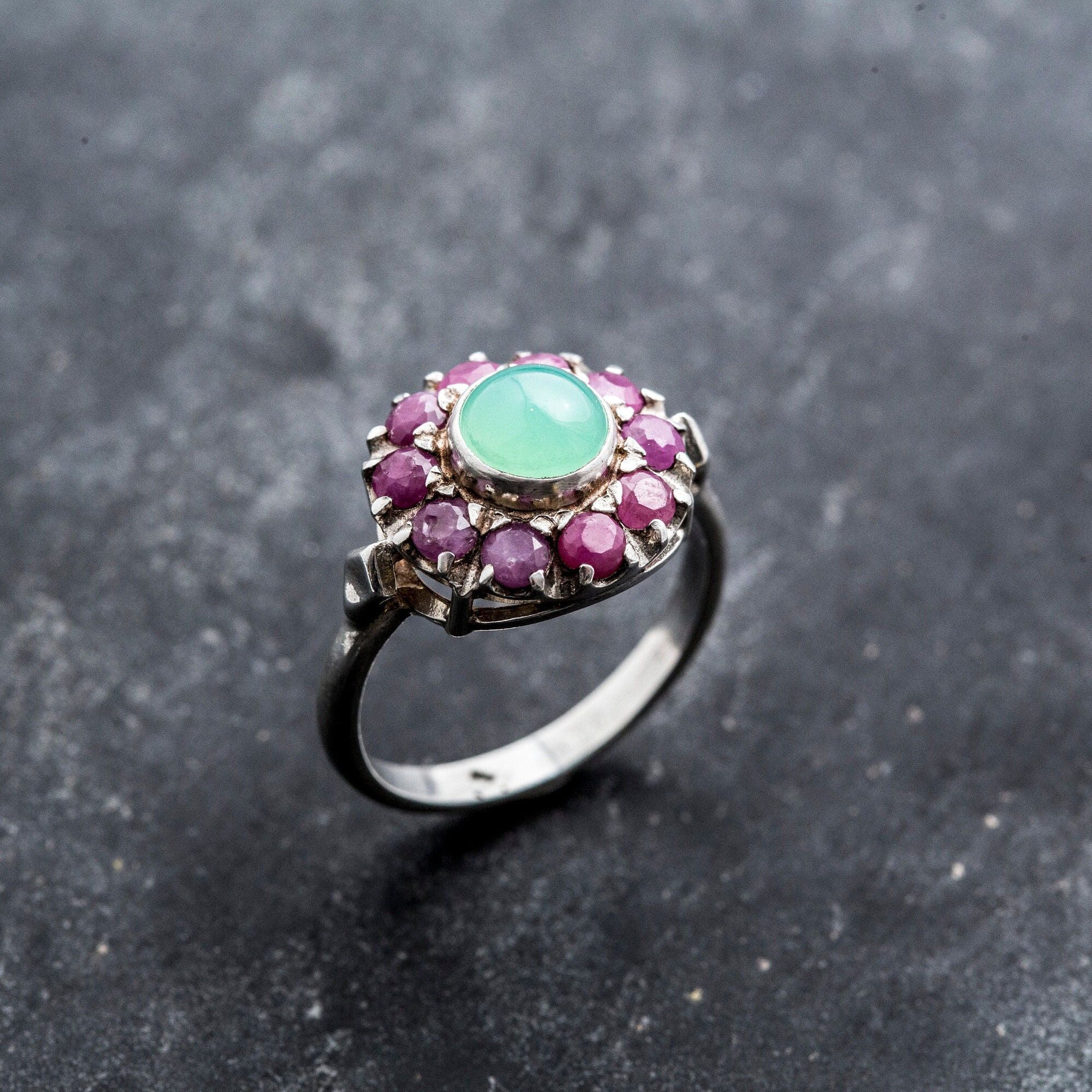 A close-up of a delicious dessert, featuring layers of chocolate and caramel, elegantly plated and garnished.