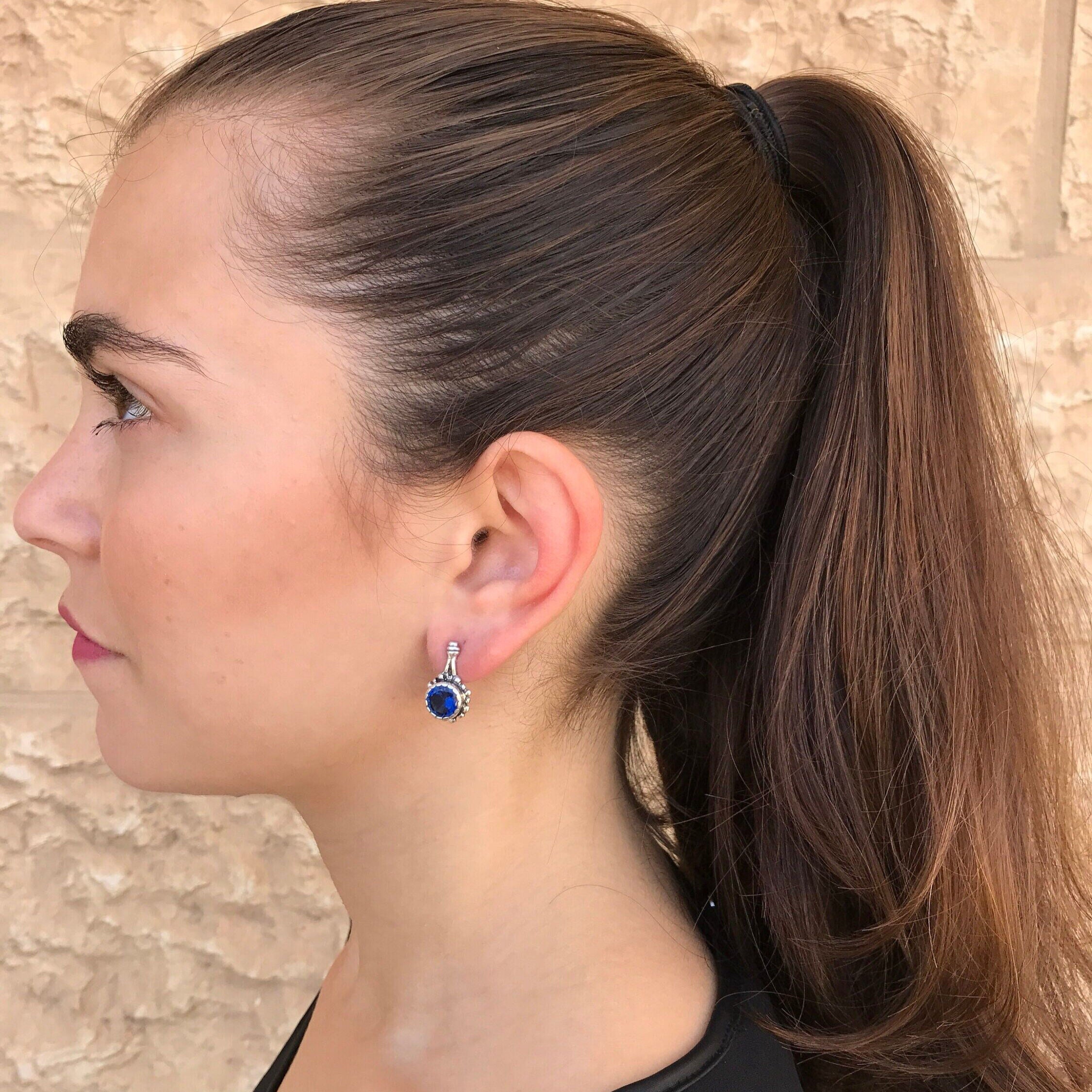 Stylish 925 Sterling Silver Earrings with Created Blue Sapphire, a thoughtful gift representing truth and elegance for any occasion.