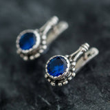 Stylish 925 Sterling Silver Earrings with Round Created Blue Sapphire, ideal for daily wear and meaningful gifting moments.